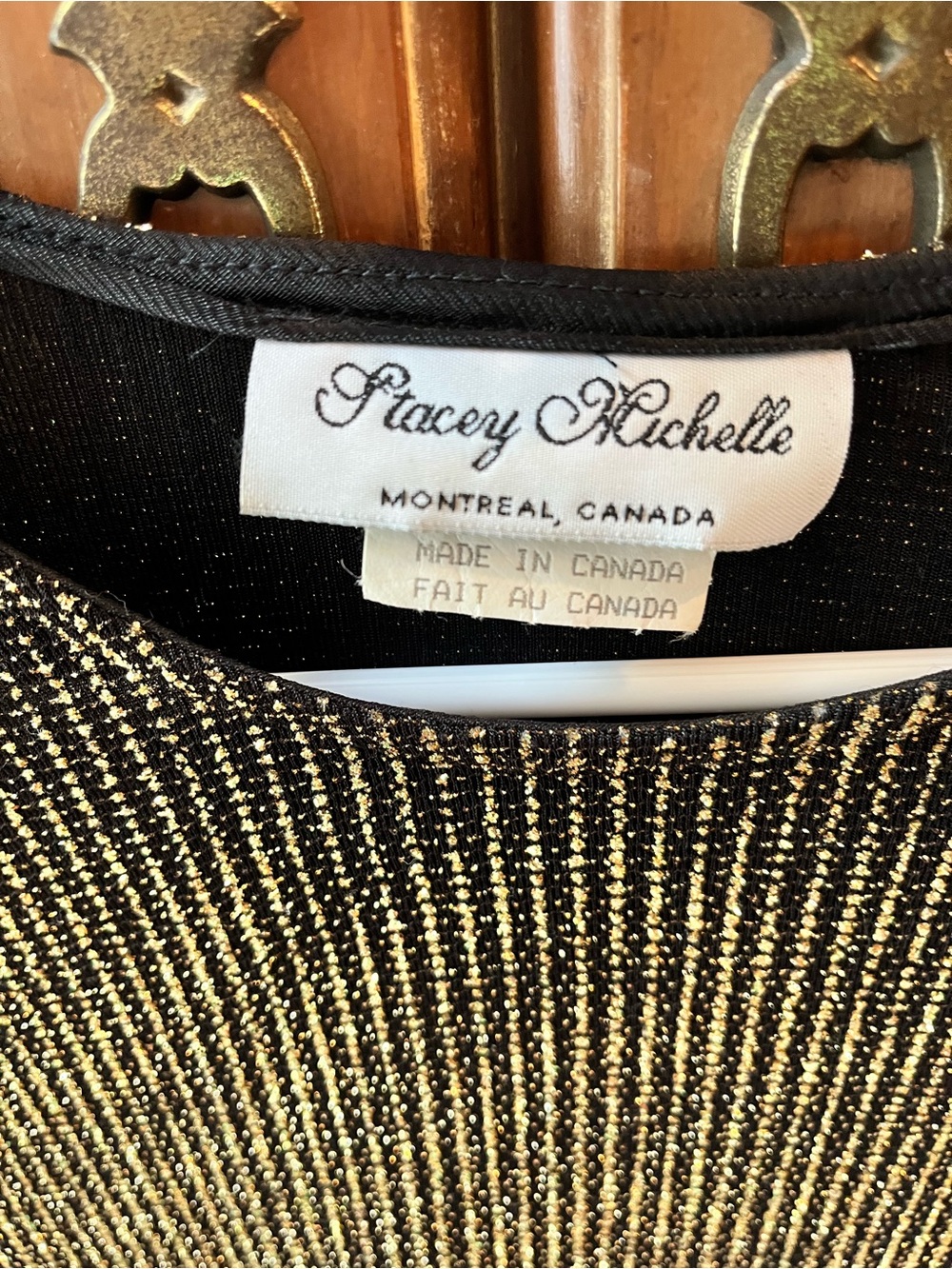 METALLIC GOLD & BLACK SPARKLY PULLOVER TOP. NYLON, METALLIC, SPANDEX. SMALL.
